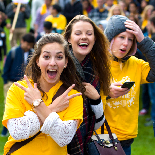 Happy students at an outdoor event
