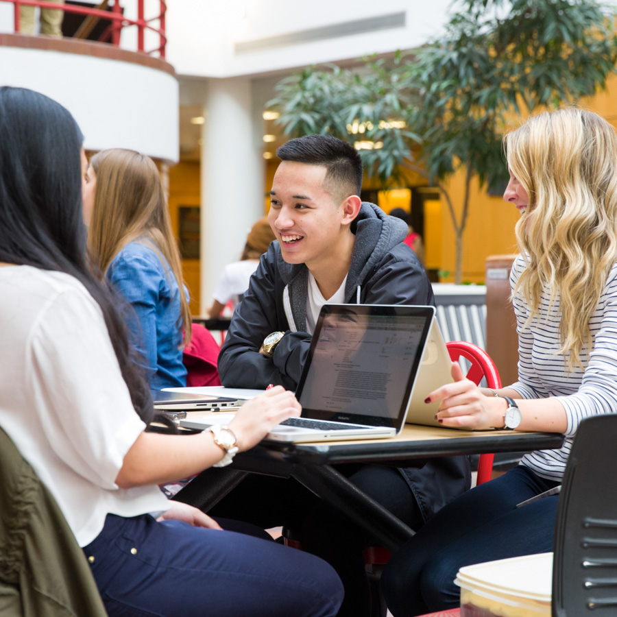 A group of students talk candidly.