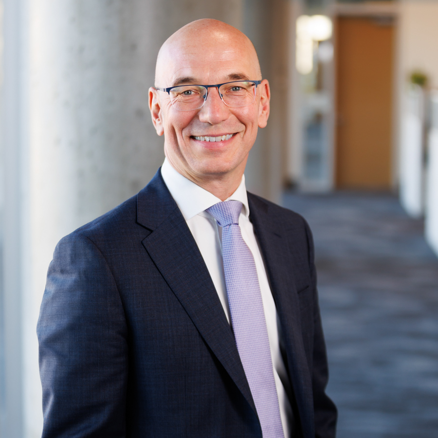 A male executive in a suit and tie.